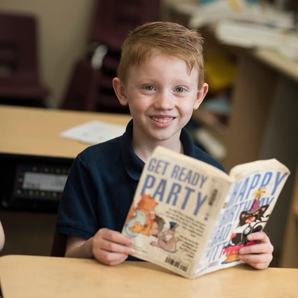 student reading a book