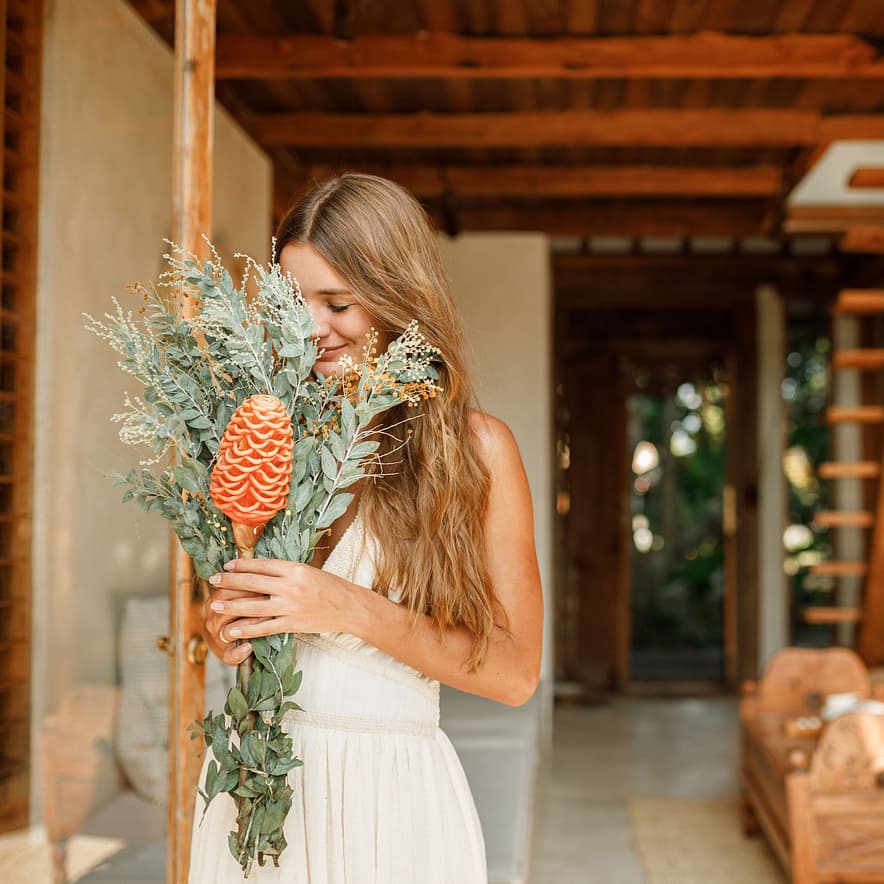 Bride-to-be holding wedding decorations