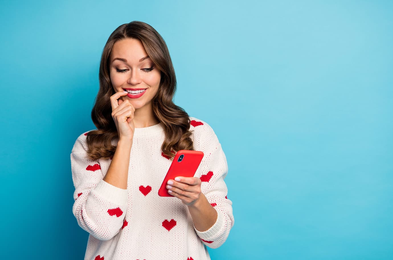 Woman looks at her phone