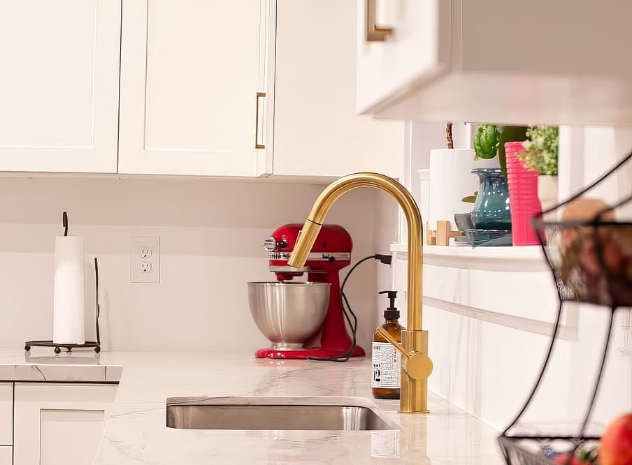 Kitchen with brass finishes