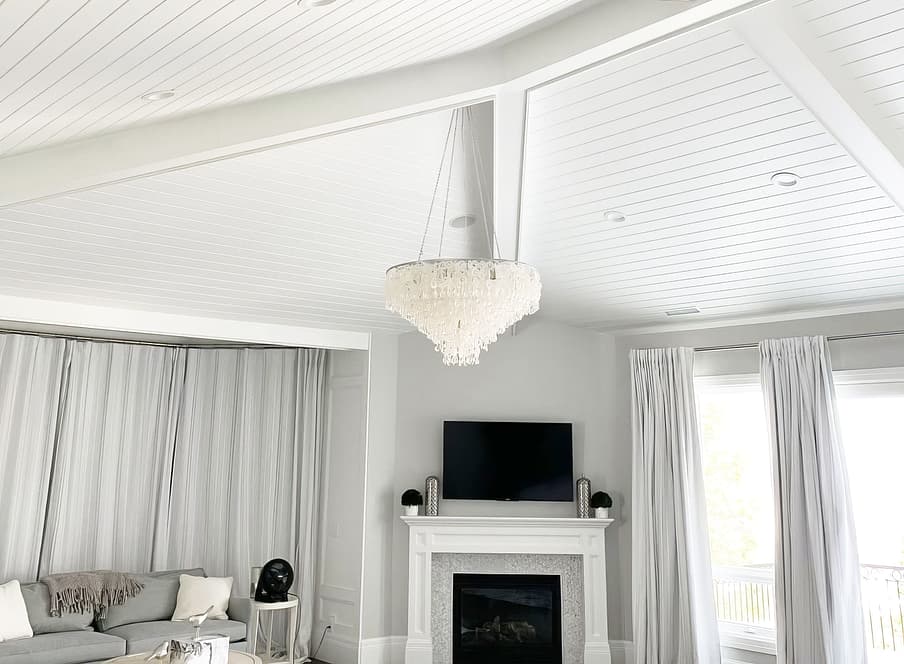 Ceiling beams with wainscoating