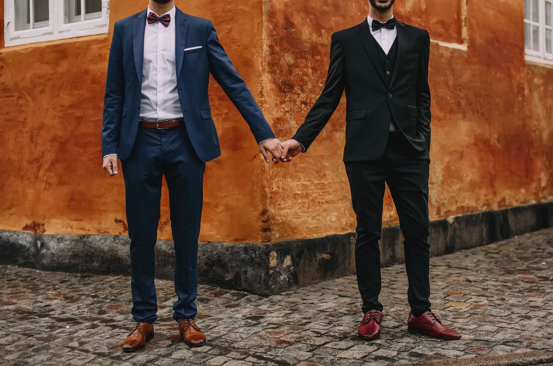 Gay couple holding hands