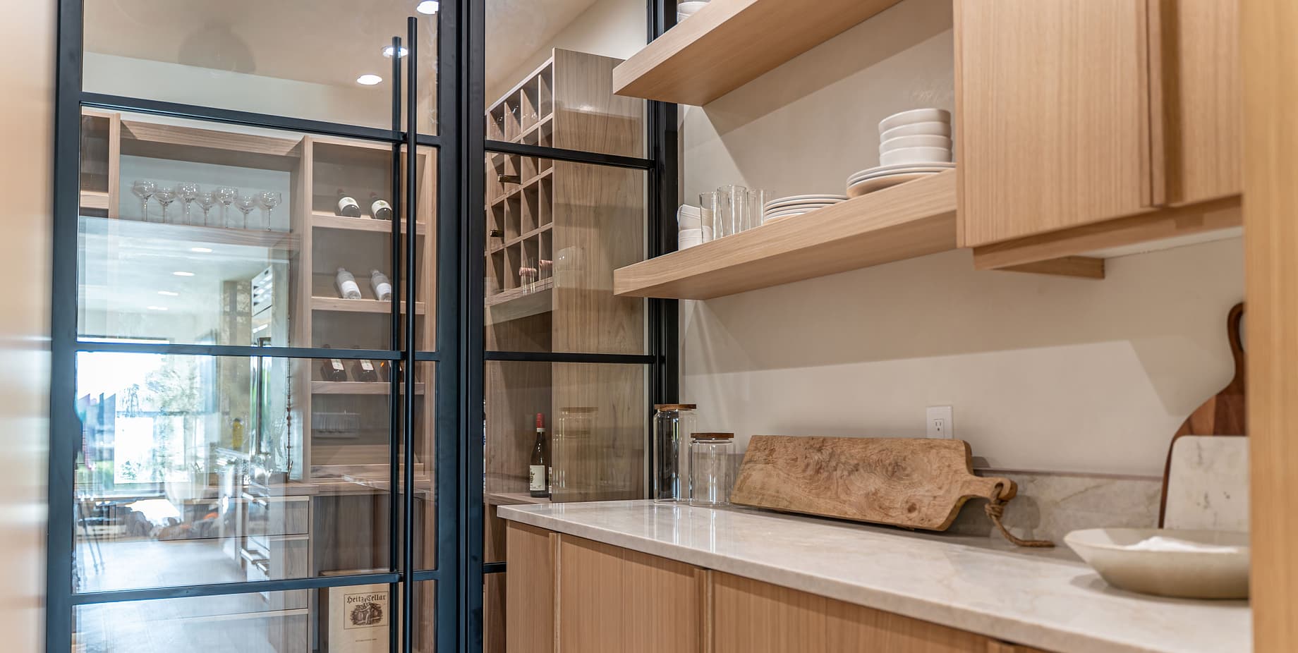 Butler's pantry with built-in wine room