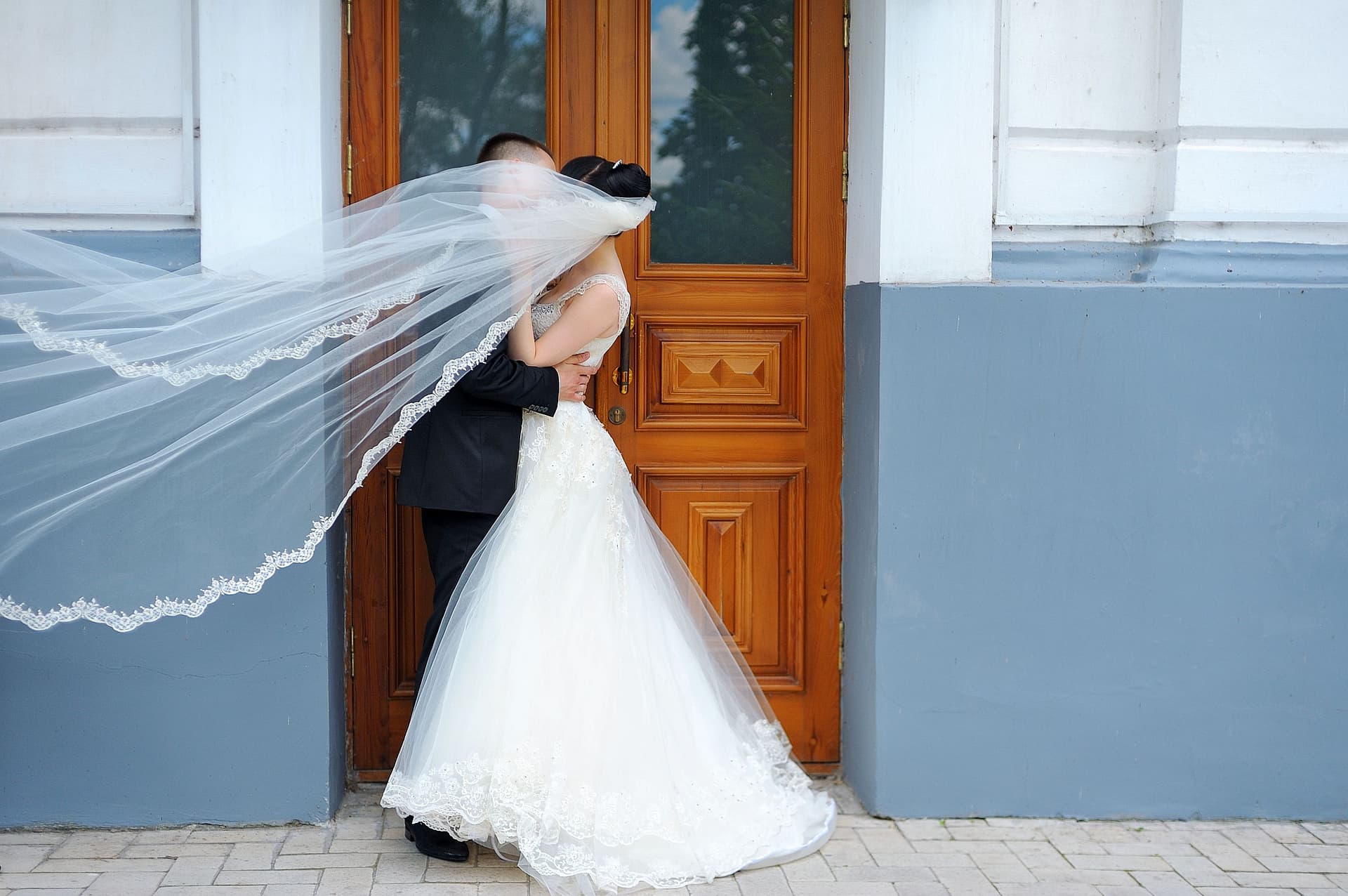 Married couple kissing