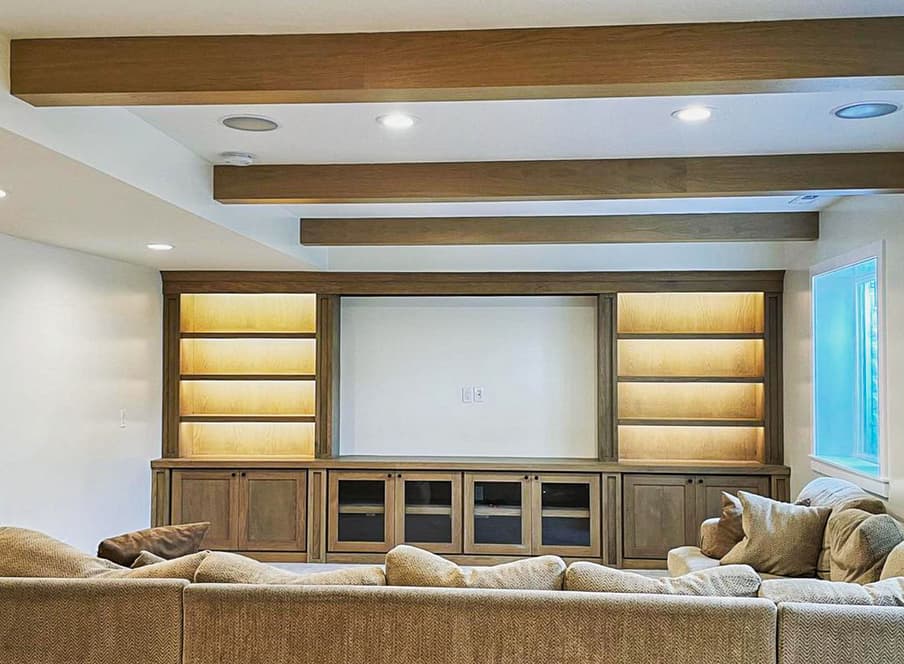 Bookshelf built-ins with matching exposed beams