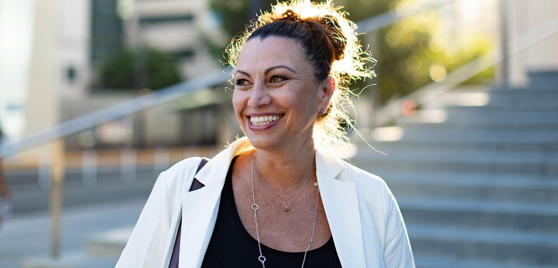 Woman smiling in city downtown