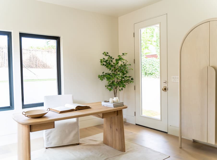 Office with warm flooring, tons of windows for Salt Lake City custom home featured in the Salt Lake City Parade of Homes.