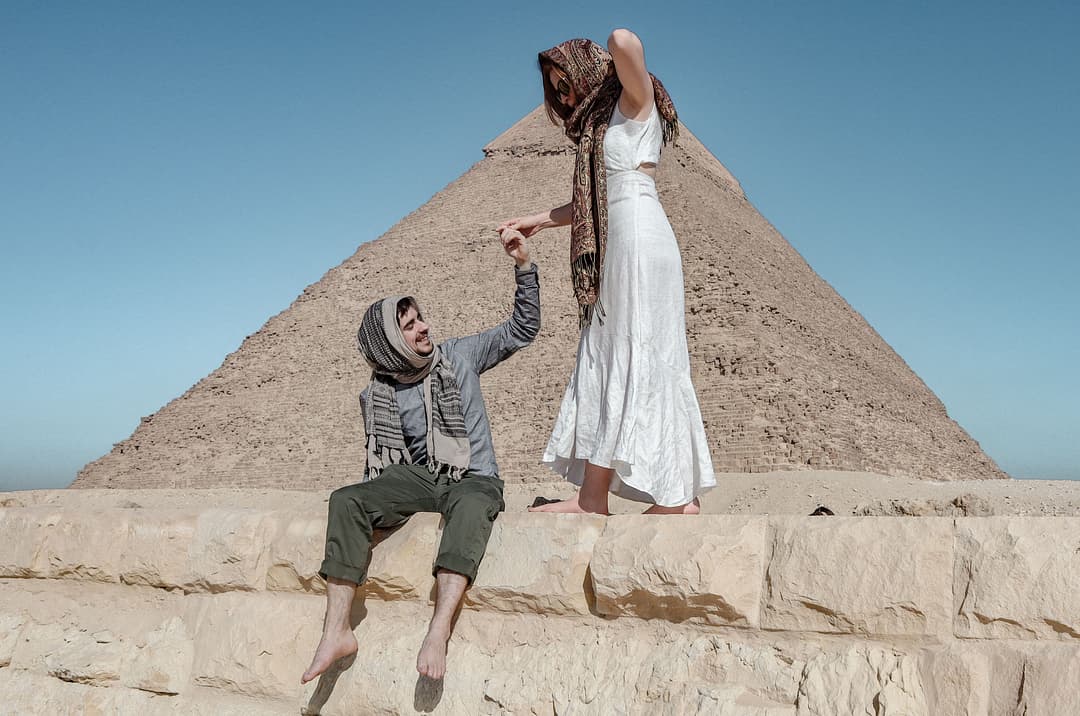 Couple in front of the pyramids 