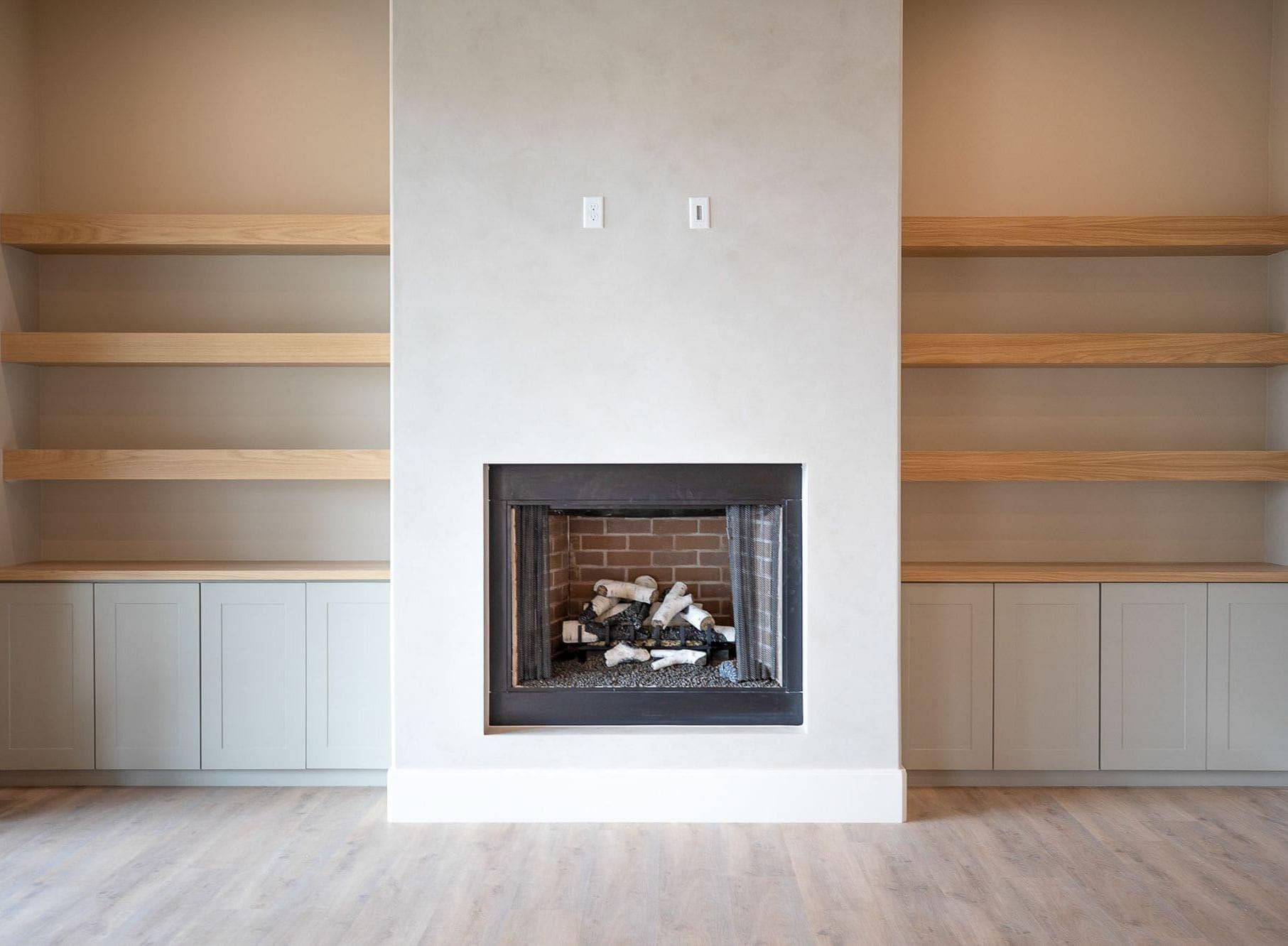 Bookshelf built-ins with matching exposed beams