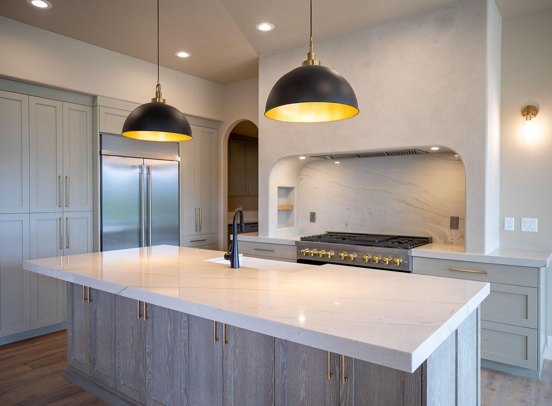 Custom kitchen with large island in the Springbrook home in Midway, Utah