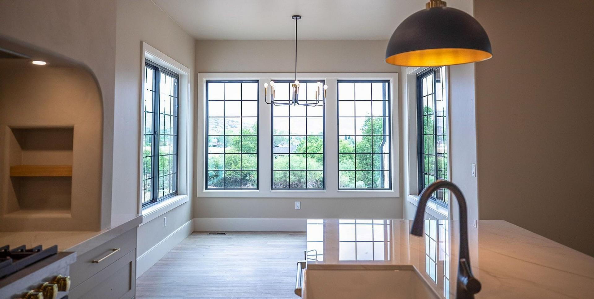 Open concept custom kitchen with large island in the Springbrook home in Midway, Utah