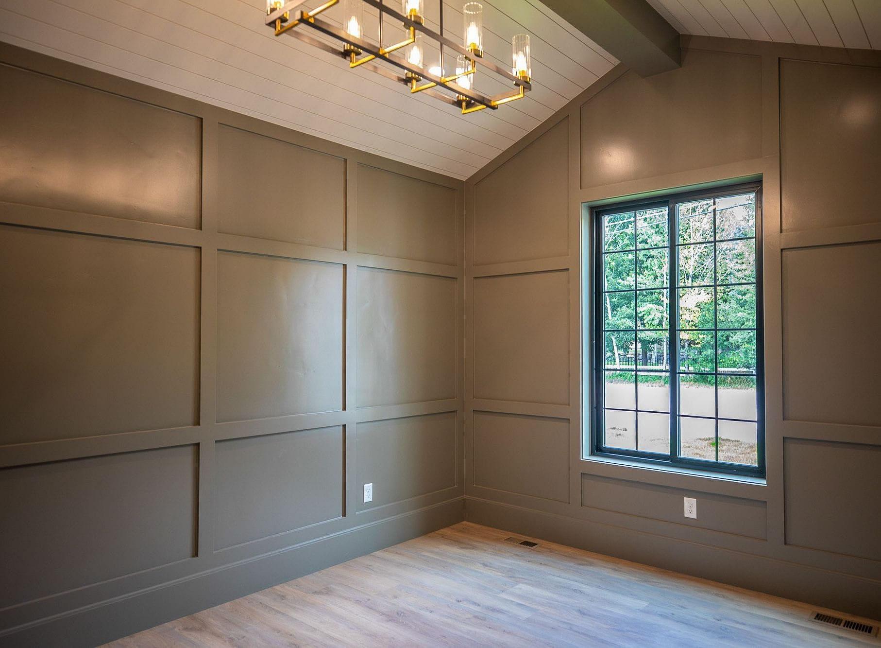 Office with paneling and accent colors at the Springbrook custom home in Midway, Utah