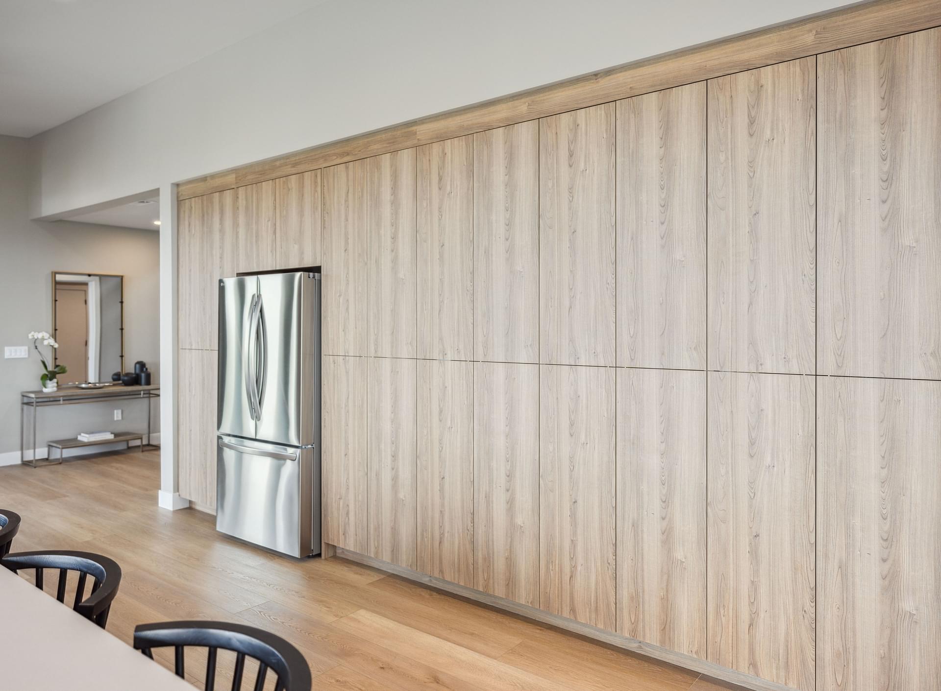 Custom wood cabinetry and kitchen island in the East Bench residence in Salt Lake City, Utah.