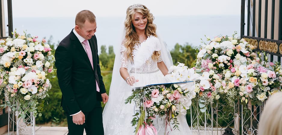 Couple looking at their marriage certificate